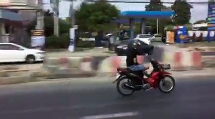 Man Uses Phone While Riding Motorbike Cross-legged