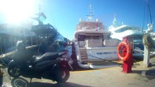 Cycling next to yachts