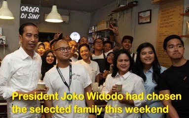 President Jokowi drinks at a local coffee shop