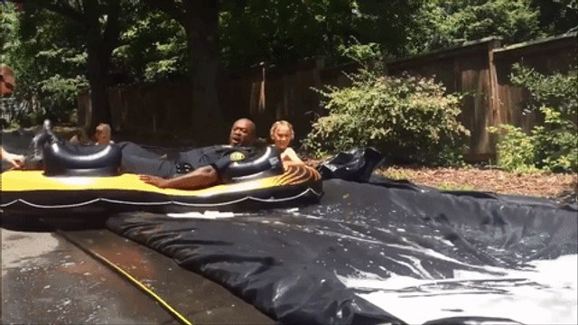 North Carolina Police Officer Takes a Plunge on a Slip-N-Slide