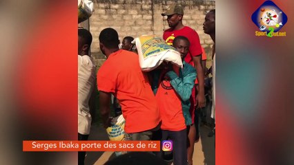 SERGE IBAKA PORTE DES SACS DE RIZ