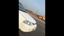 Imran Khan driving Suzuki Cultus at Motorway Islamabad