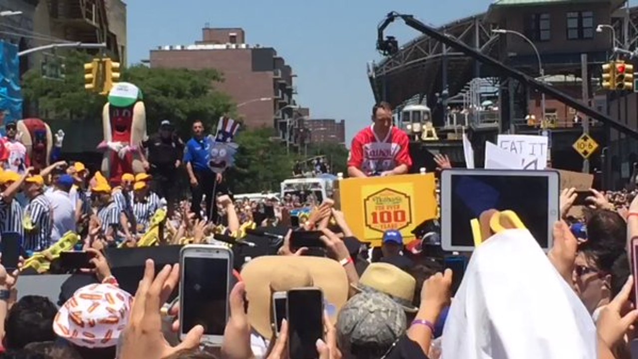 Joey Chestnut Celebrates Breaking Record to Win Nathan's Hot Dog Eating Contest