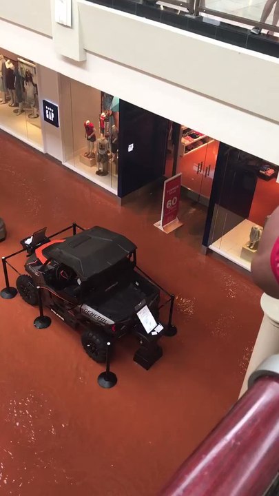 Flood Water Swamps Oklahoma City's Penn Square Mall