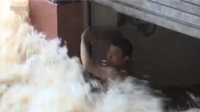 Chine: l'incroyable sauvetage d'un homme piégé par les inondations