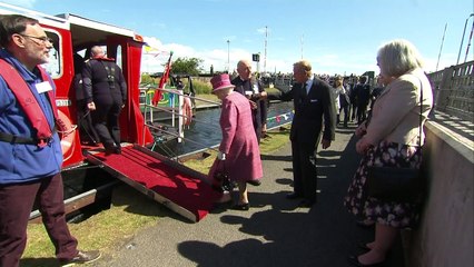 The Queen pets a Shetland pony