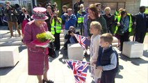 The Queen pets a Shetland pony