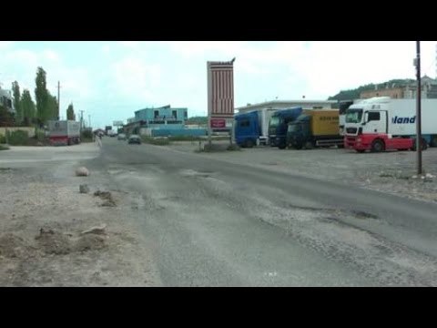 Report TV - Rruga Vore-Doganë-Rinas makth për shoferët,firma nuk e riparon