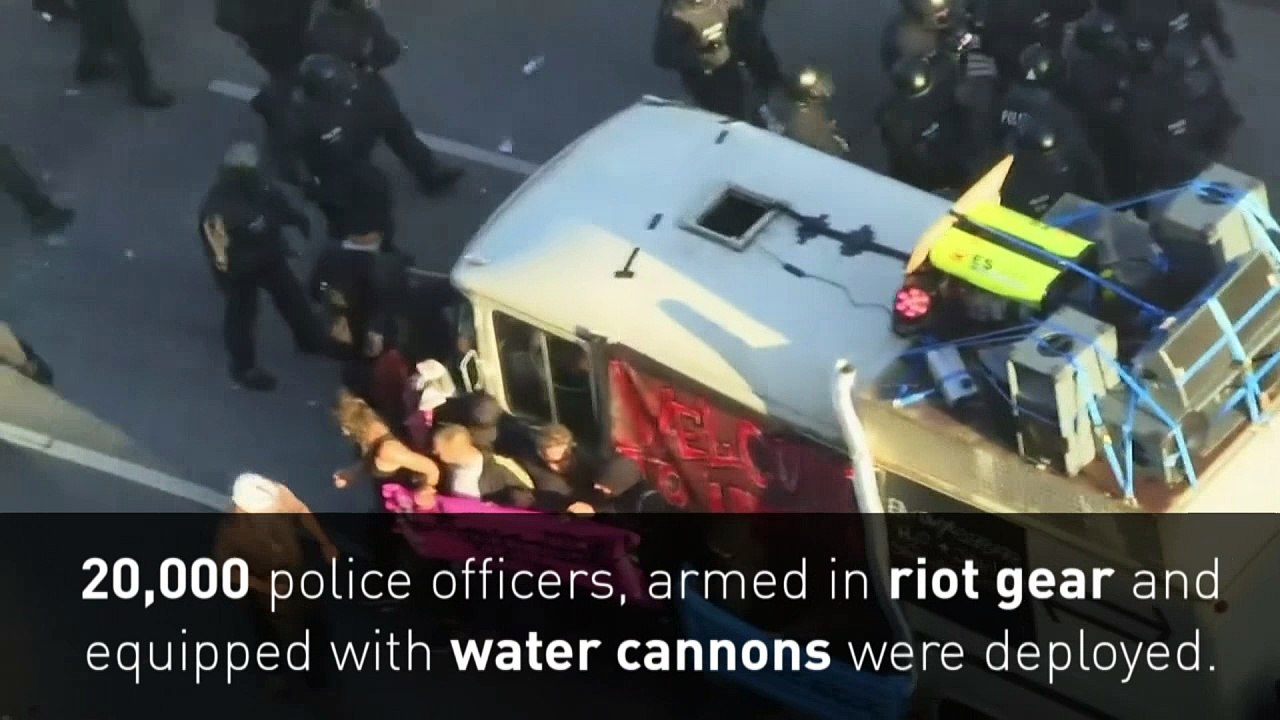 Police and protesters clash outside G20 summit