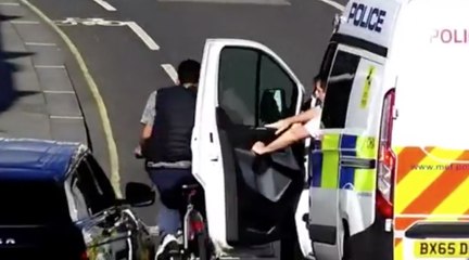 WATCH: Police Use Van Door To Knock Thief Off Bike
