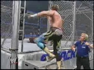 rey mysterio vs eddie guerrero ( cage )