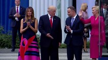 Awkward handshakes and nudges as Trump meets Duda