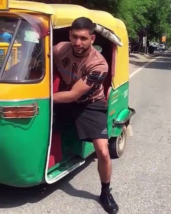 Boxer Amer Khan Need to work on his wifes makeup thank taxi jobs.