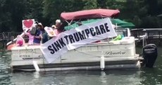 N. Carolinians On Boats Protest Outside GOP Senator Thom Tillis' Lake House