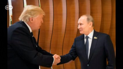 O primeiro aperto de mão entre Trump e Putin