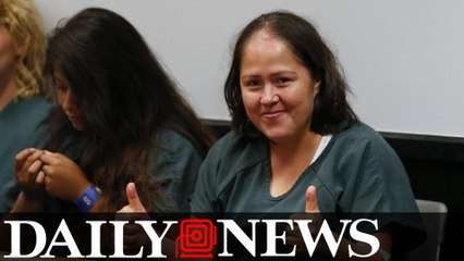 Mother accused of killing kids and husband gives thumbs up in court