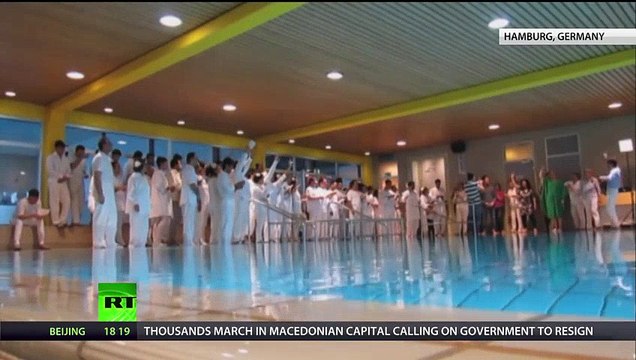 Mass Baptisms: More Muslim refugees coming to EU convert to Christianity