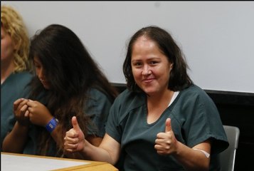 Illegal immigrant mom accused in stabbing deaths of children, husband smiles in court