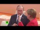 Can someone read lips? What are Merkel and Putin talking about at G20?