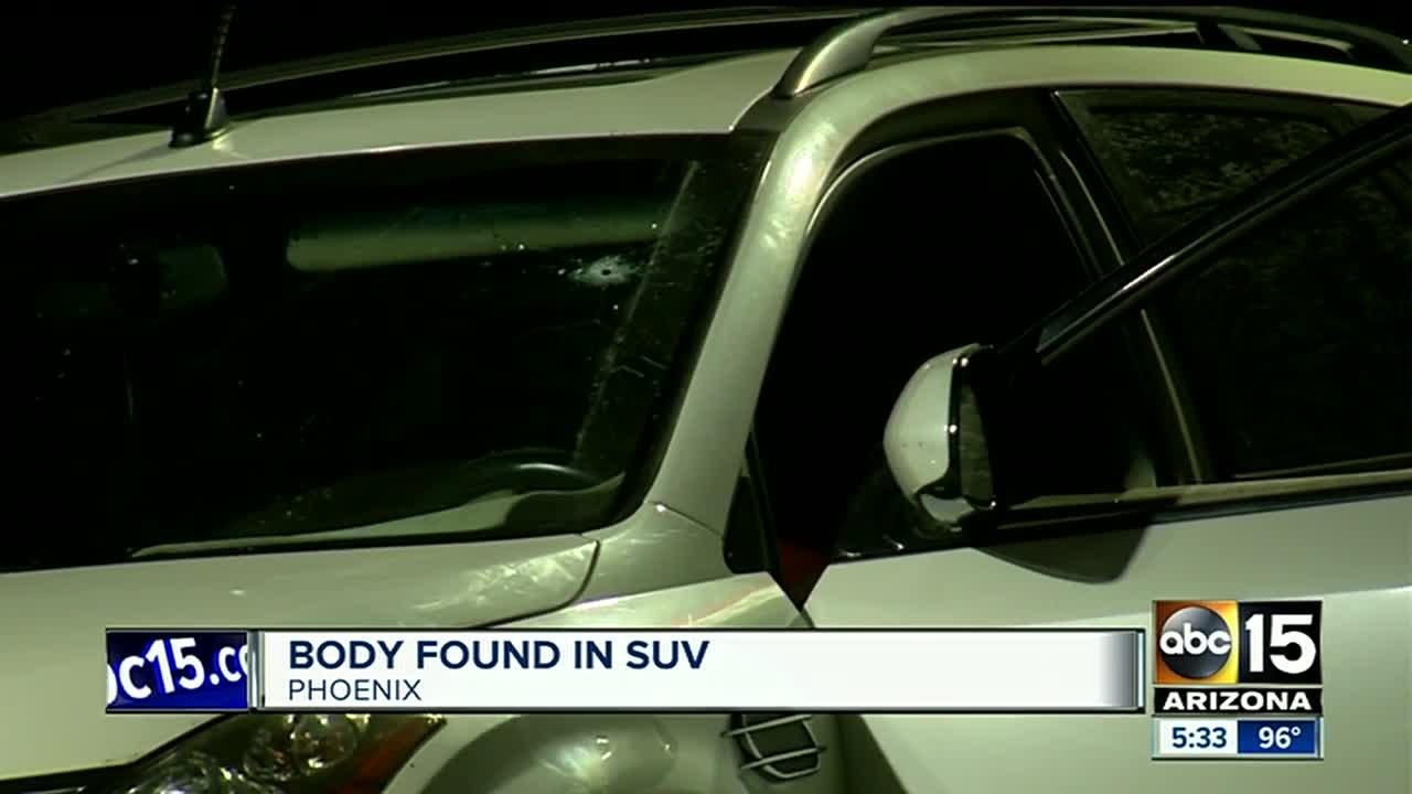 Police investigating after body found in SUV in...