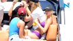 Party boat! Hailey Baldwin frolics in purple bikini on Miami cruise with Joe Jonas and Wilmer Valderrama