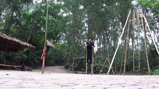 Vietnamese girl walking on bamboo stick - Funny Vietnamese folk games