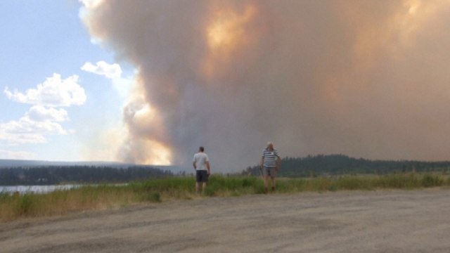 Thousands evacuated after British Columbia wildfires spread