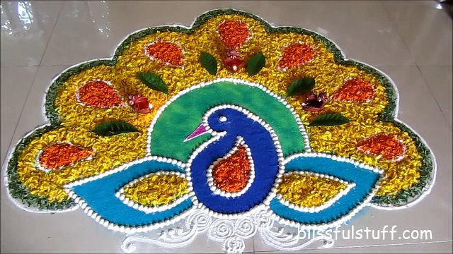 Diwali Special Peacock Rangoli Design with marigold flowers / How to make rangoli with flowers