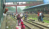 Fully loaded Dewangang commuter train entering Biman bondor railway station ,Bangladesh