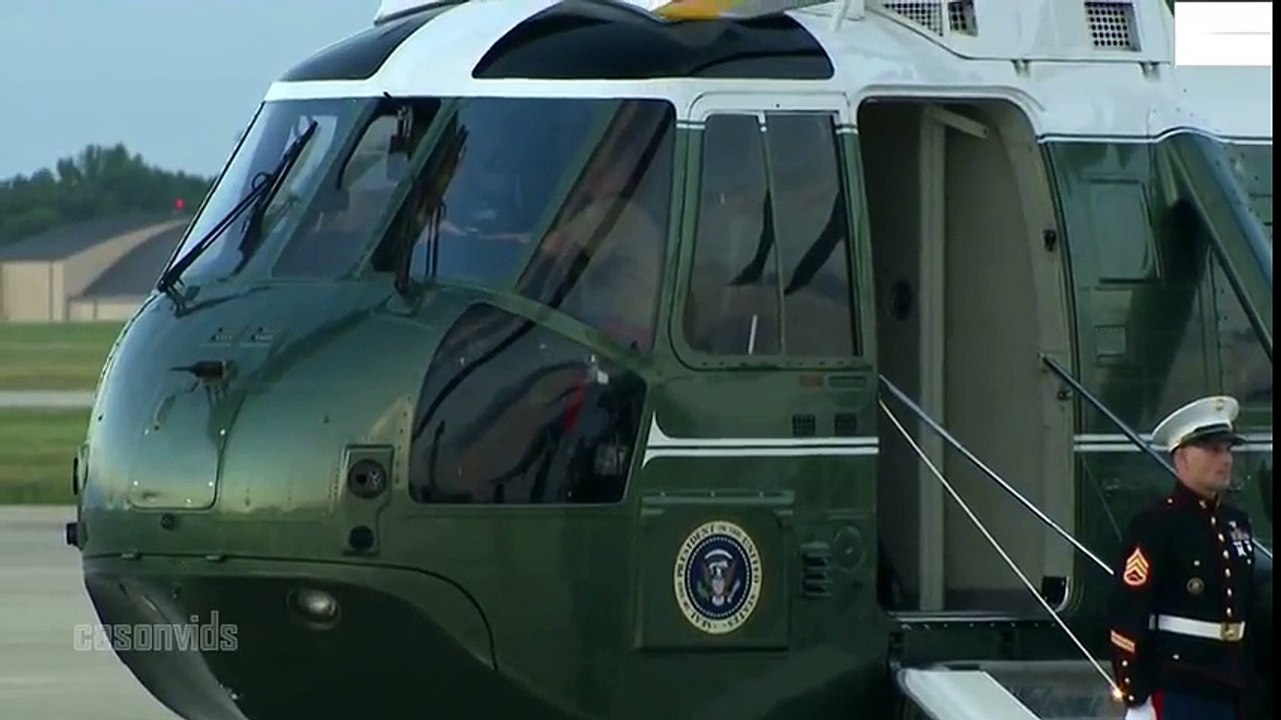 INCREDIBLE Moment President Trump puts ROCK SOLID marines hat back after wind blows it away