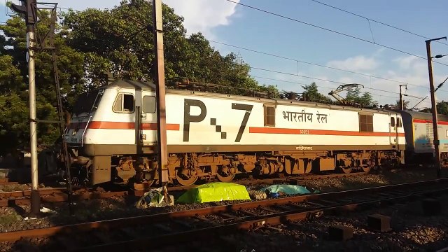 GZB WAP-7 Sealdah Rajdhani moves gracefully against the setting Sun