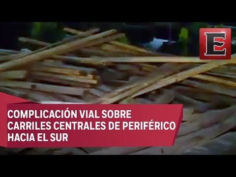 Tráiler tira tablas de madera sobre Periférico y Palmas