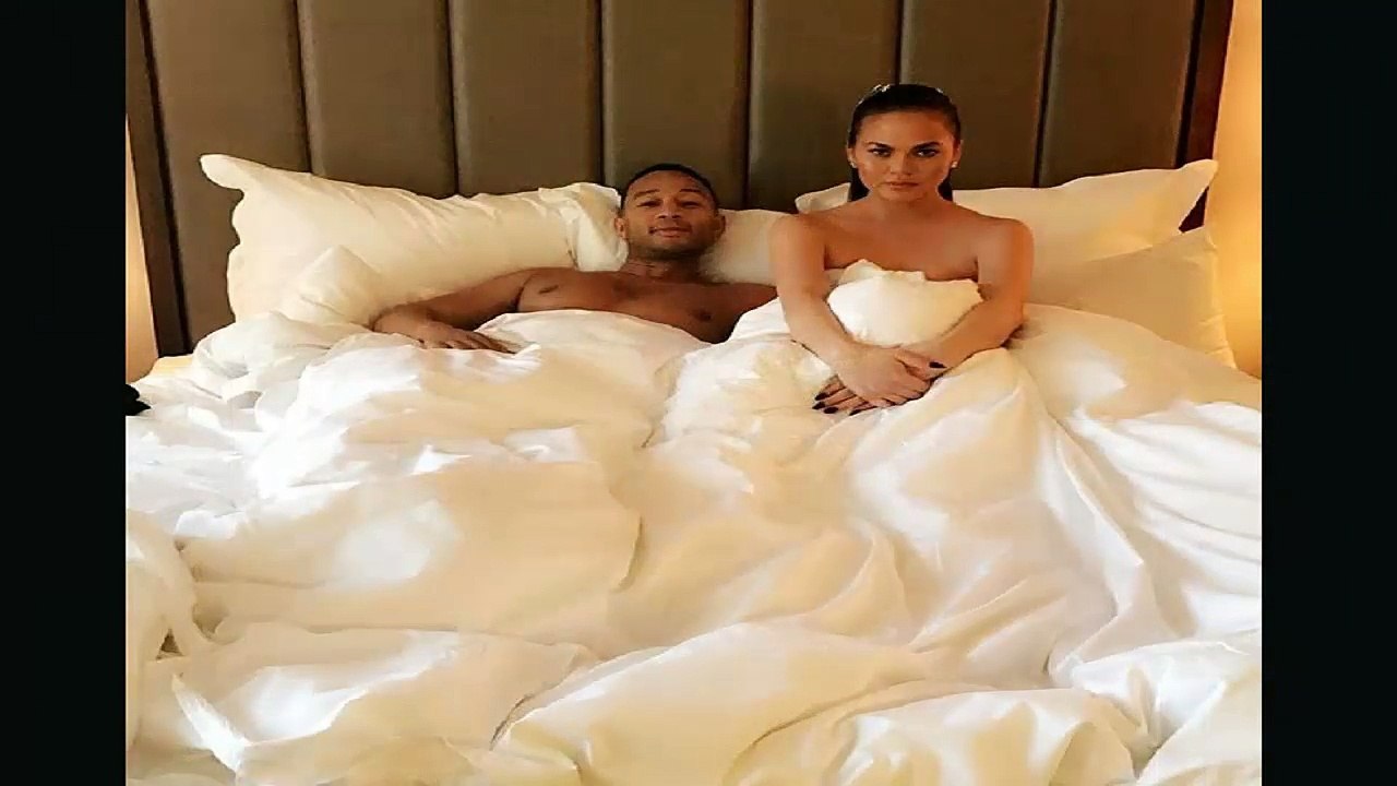 Chrissy Teigen surprises by showing up nuude in bed