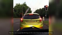 Driver caught watching football behind the wheel