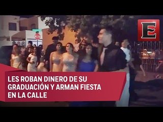 VIDEO: Festejan graduación en plena vía pública, su compañera los estafo