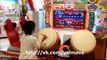 Japanese kid playing on Taiko drums in arcade