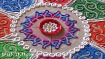 Multicolored rangoli with paisley pattern / Creative and unique rangoli design by Poonam Borkar