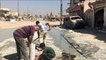 سكان غرب الموصل يعيدون إعمار وتنظيف ما خلفته المعارك