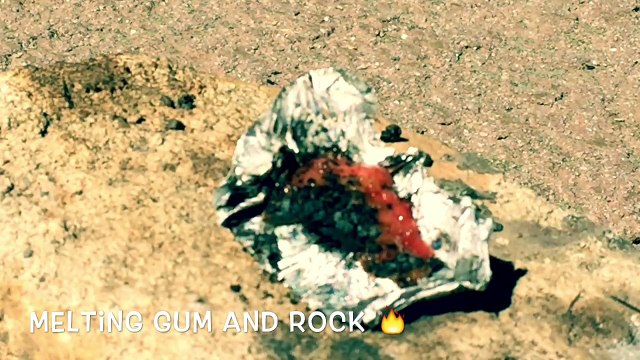 Using big magnifying glass # 5 Gum and rock