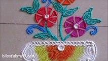 Easy and small flower pot rangoli using quilling comb Creative rangoli designs by Poonam Borkar