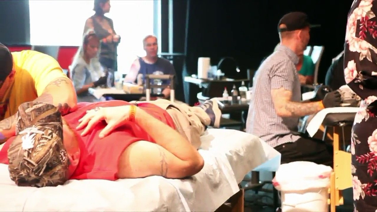 Group of Tattoo Artists Cover Scars of 9/11 Survivors For Free