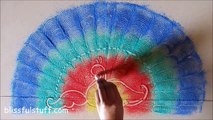 Peacock rangoli using paper quilling comb / Innovative rangoli designs by Poonam Borkar