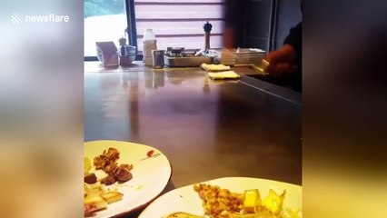 Chinese chef performs amazing tricks with an egg and a spatula