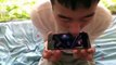 It's on the tip of his tongue: Chinese man plays mobile game with mouth