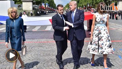 Trump's 'never-ending' handshake with Macron