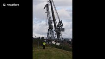 Cranes in UK demolished by controlled explosions