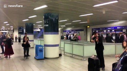 Duet play Game of Thrones theme at Kings Cross, London