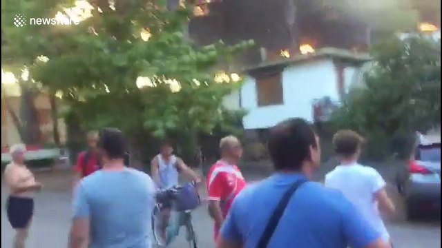 Forest fire threatens homes in central Italy