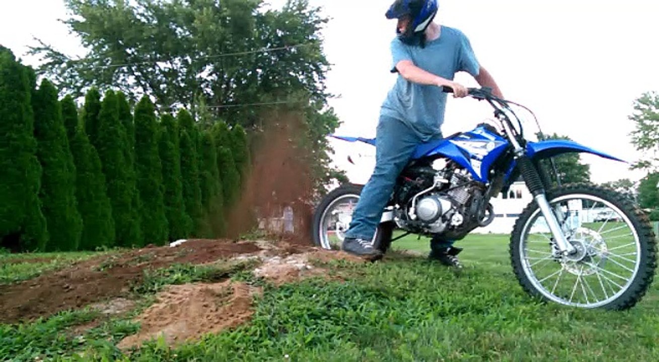doing a burnout in dirt with my dirt bike