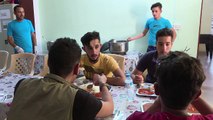 Separated by war, Iraqi children wait for parents